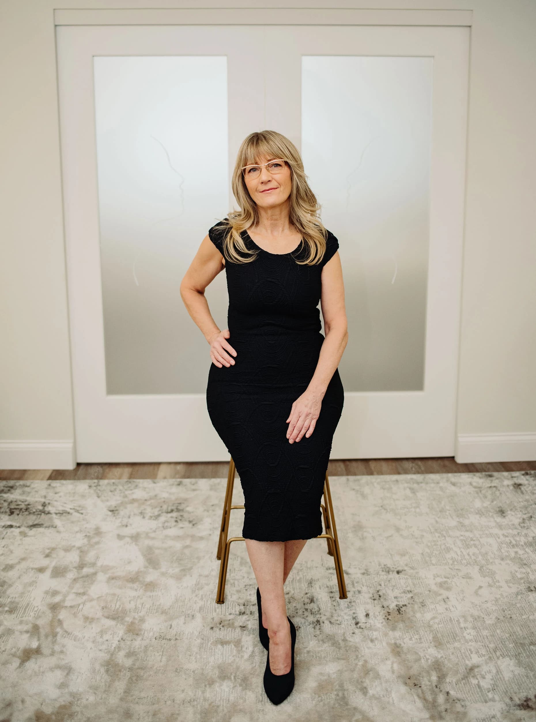 Louise Green providing a personalized skincare consultation at her Ottawa clinic