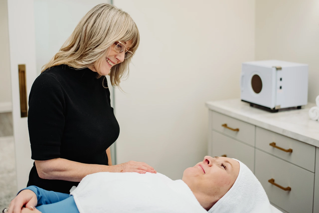 Louise Green from Great Skin Ottawa teaching a client How Often To Get A Chemical Peel