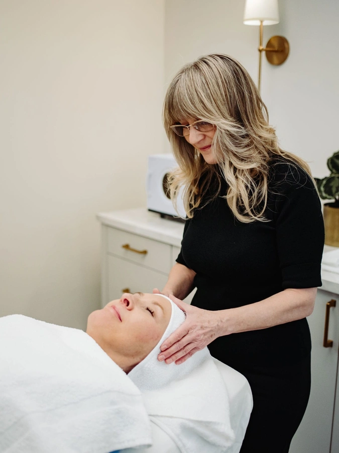 Relaxing facial treatment session by Louise Green at her skin clinic in Ottawa